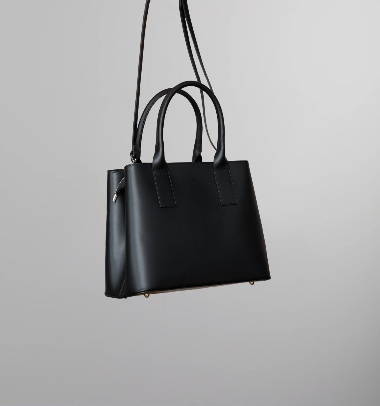 Image of Solid Handheld bag