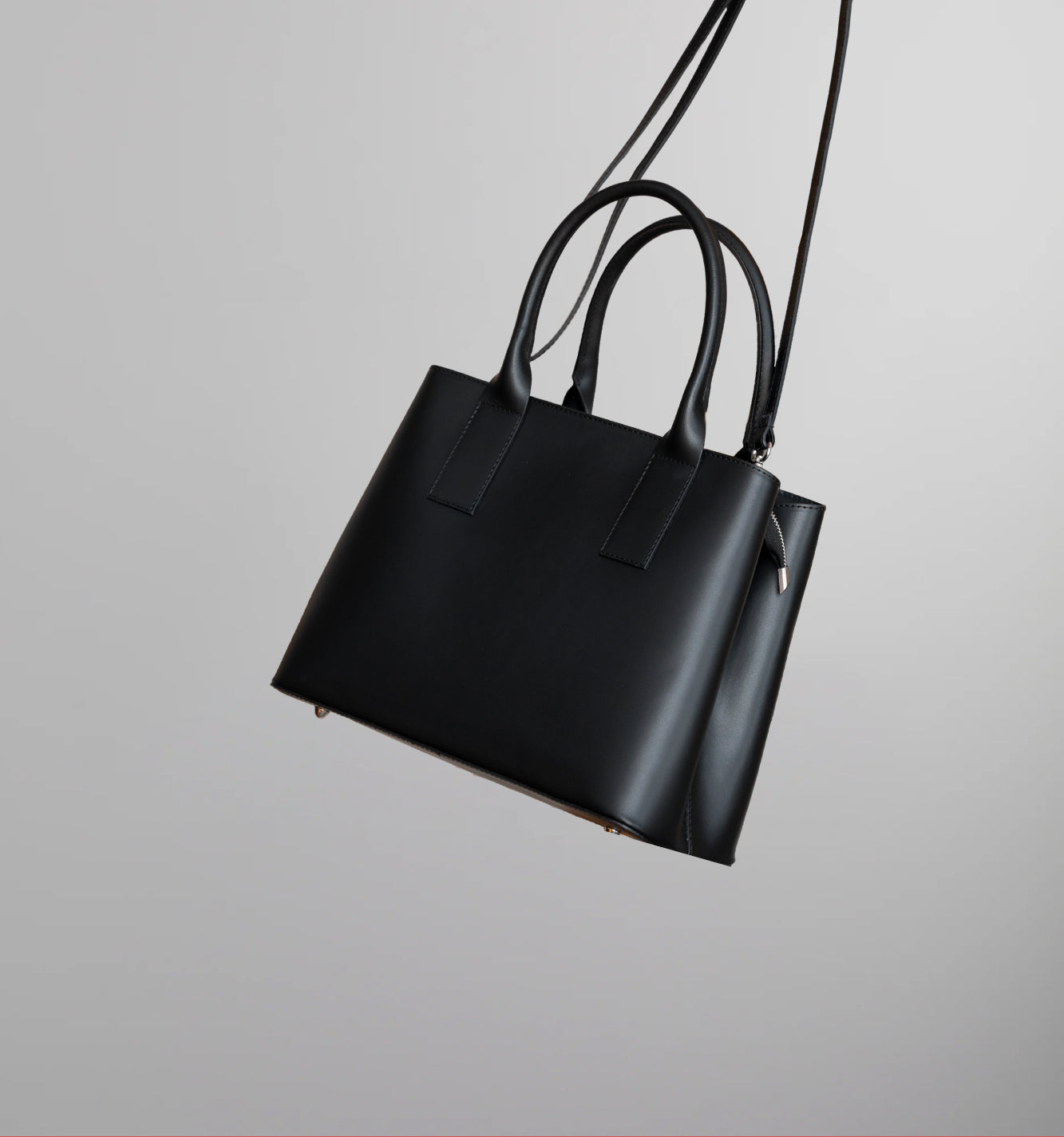 Image of Solid Handheld bag